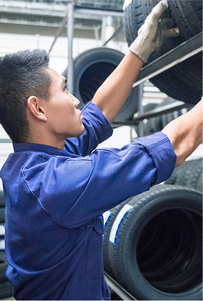 Man technician with a blue uniform named Izusek