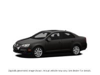 2010 Volkswagen Jetta 4Dr 2.0T Tsi Man Wolfsburg Deep Black Pearl  Shot 1